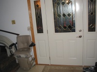 This is the front door.  Visible on the left is the actual stair lift.  It's battery powered, and charges at the ends.  The front door was replaced several years ago.