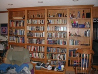 The bookshelf.  All sorts of sci-fi, fantasy, textbooks, and assorted reading.