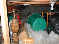 Looking into the crawlspace.  Lots of random stuff.