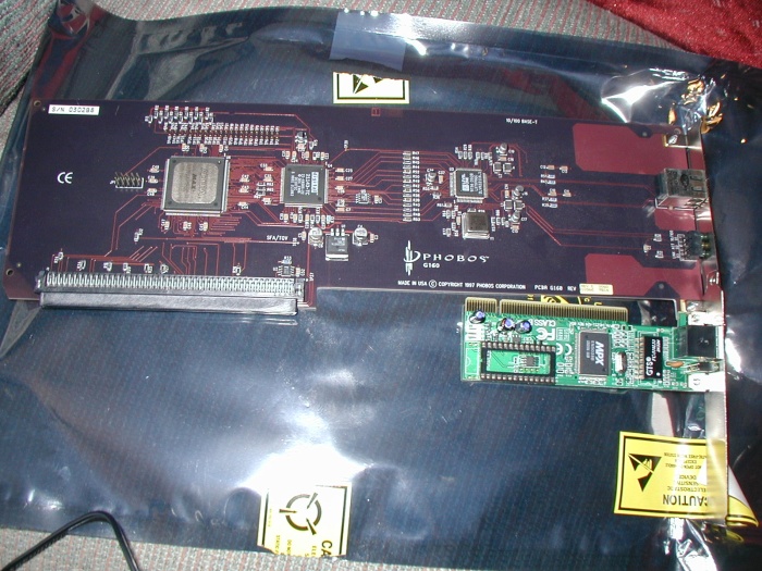 It's really, really big.  10/100 NIC for an SGI Indigo 2.  A PCI NIC is included for reference.