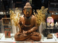 The whole Buddha, with the Jesus Action Figure to the right.