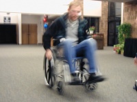 Chad, moving quickly, in a wheelchair.