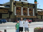 Russ, Alan, and Dennis standing outside the corn palace.