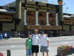 Russ, Alan, and Dennis standing outside the corn palace, again.