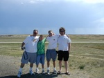 All of us on a scenic viewpoint.  It was 109F when this picture was taken, with a 30-40mph wind (blast furnace?) blowing.
