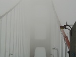 Entering the Golden Gate bridge.  It was quite foggy.  The bridge just disappears into the mist.