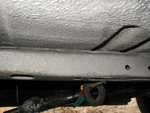 Underside of the car.  Minimal rust.