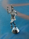 The hood ornament up close.  It's from a marching band trophy my brother dug out of a dumpster somewhere.