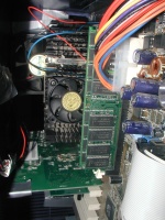 The chip was an AMD Athlon 800 (or so), a stick or two of PC133 RAM lived in the system, and the AGP video card had a TV tuner and other nice stuff.